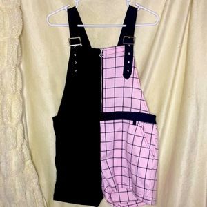 Half pink plaid and half black overalls with belt loop